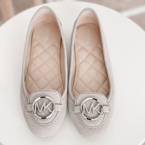 MK silver flats size 6.5